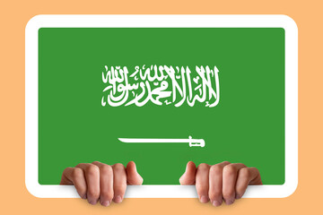 Hands holding a white frame with Saudi Arabia flag, protest or social issues in Saudi Arabia, two 