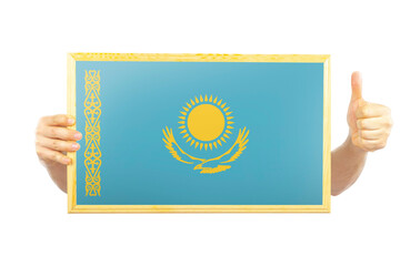 Hands holding a frame with Kazakhstan flag, two hands and thumb up, approvement or success 