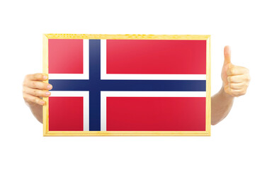 Hands holding a frame with Norway flag, independence day idea, two hands and thumb up, approvement 