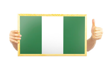 Hands holding a frame with Nigeria flag, two hands and thumb up, celebration or victory concept