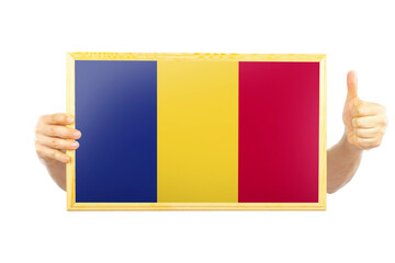 Hands holding a frame with Romania flag, two hands and thumb up, independence day idea, approvement 