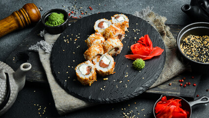 Sushi roll with tuna and cream cheese (Philadelphia). Asian cuisine. Close up. Free space for your text.
