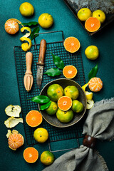 A bowl of juicy orange tangerines. Citrus fruits are rich in vitamin C. Autumn fruits.