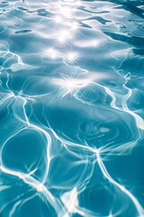 Obraz premium Blue water surface with bright sun light reflections, background closeup.