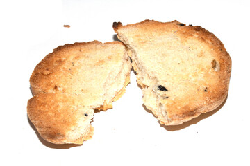 Very Burnt Bread Roll Torn or Cut in Half Toast Close Up Texture