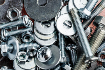 Mixed screws and nails. Industrial background. Home improvement.bolts and nuts.Close-up of various...