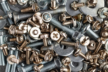 Mixed screws and nails. Industrial background. Home improvement.bolts and nuts.Close-up of various...