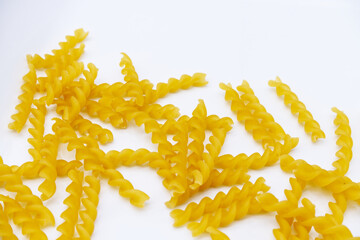 Fusilli pasta with a white background. Fusilli is a type of pasta of Italian food. The concept of...