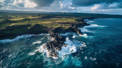 Obraz premium Aerial view of a rugged coastline with dramatic rock formations and crashing waves, showcasing the power of the ocean