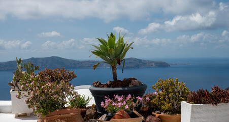 Scenic view from Fira, Thira island towards the collapsed cone of the Santorini volcano, Cyclades...