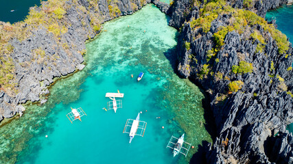 Beautiful Aerial view of One of the best island and beach destination in the world, a stunning view of rocks formation and clear water of El Nido Palawan, Philippines.