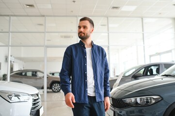 Man adult customer male buyer client wears chooses auto