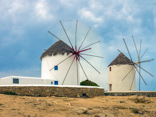 The iconic old wind mills of the old town of Mykonos, Cyclades Islands, Aegean Sea, Greece