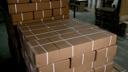 Boxes in warehouse. Large group of stacked boxes. Large number of cardboard boxes in warehouse...