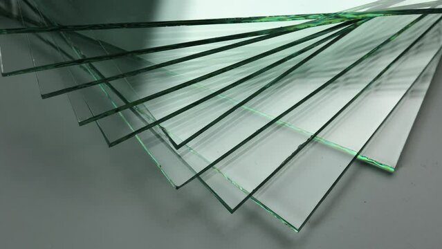 Sheets of Factory manufacturing tempered clear float glass panels cut to size.