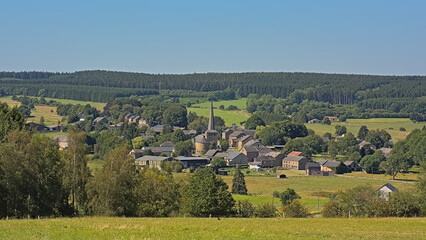 Old village of Tillet with traditional houses and church in the hills of Ardennes 