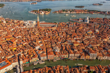 Amazing city view from above on building roofs and canals. Aerial view of Venice, San Polo, Italy.