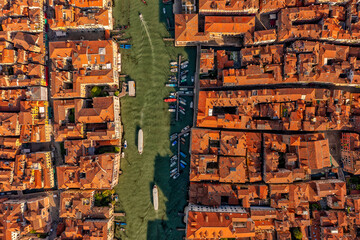 Aerial view of Venice, San Polo, Italy. Amazing city view from above on building roofs and canals. - obrazy, fototapety, plakaty