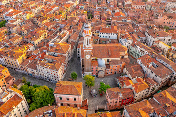 Panoramic shot Venice, Cannareggio, Italy. Tiled roofs and streets. Historical buildings. Tourism.
