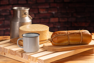 Cheese, details of beautiful and delicious cheese on rustic wooden surface, selective focus.
