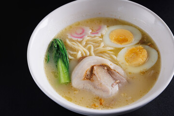 Ramen Japanese noodle isolated in black background
