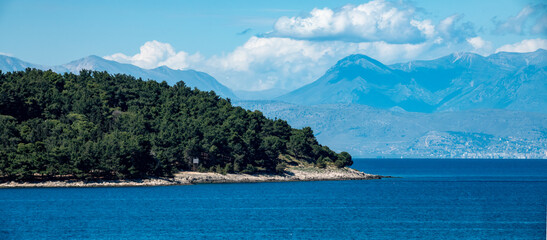 View of Vido Island with the coast of Albania in the background, Corfu (Kerkyra), Ionian islands, Greece. Corfu is actually closer to Albania than to mainland Greece,