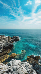 A beautiful blue ocean with a rocky shoreline
