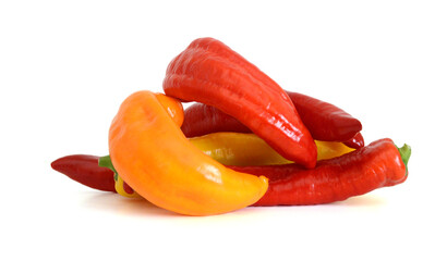 Stack colorful chili peppers isolated on the white