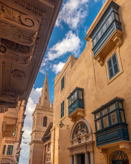 Street scenes in the old town of Valletta (Il-Belt) the capital of Malta, with St. Paul's cathedral...