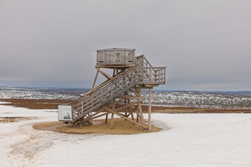 Triangulation tower located on top of Kaunispää fell in cloudy spring weather, Lapland, Finland.