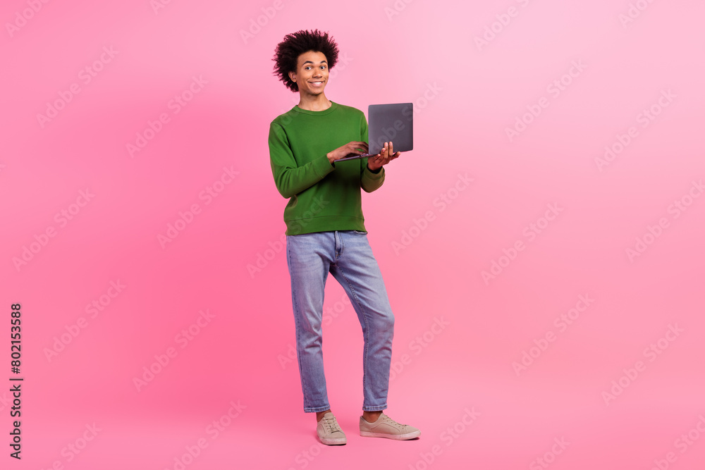 Canvas Prints Photo of happy positive guy worker using netbook coworking isolated pastel color background