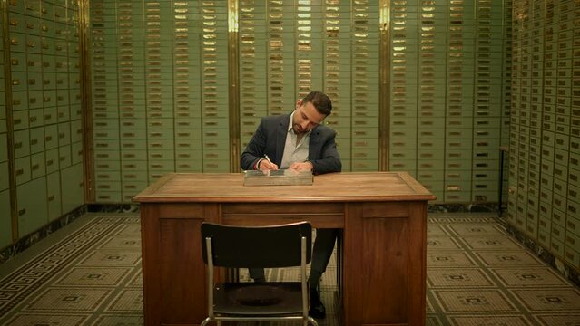 Businessman Entering Bank Safe Vault Room Storing Silver Bullion Inside Deposit