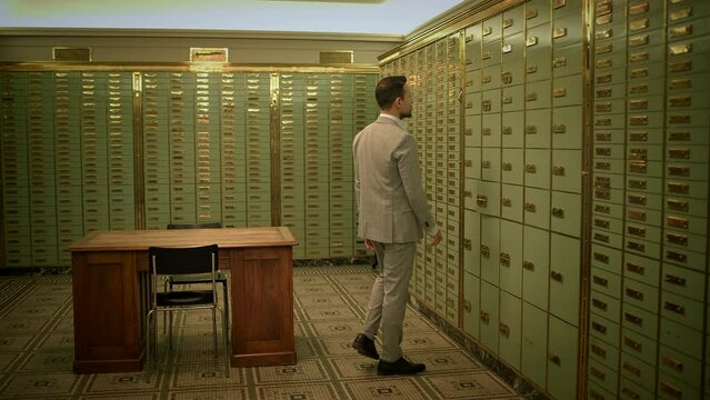 Businessman Entering Bank Safe Vault Room Storing Silver Bullion Inside Deposit