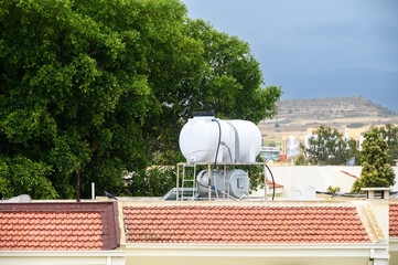 A solar powered and ecological water heater on a roof of a house 2