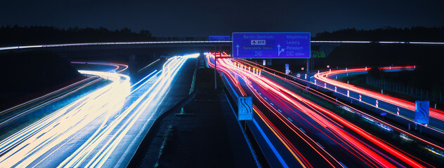 Autobahn bei Nacht - Speed - Traffic - Highway - Panorama - Datenautobahn - Motorway -  Light Trails -  Long Exposure - German  - obrazy, fototapety, plakaty