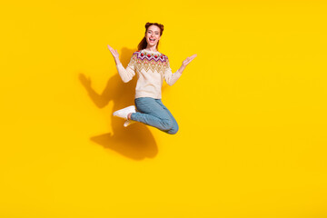 Photo portrait of attractive young woman jumping raise hands dressed stylish knitted warm outfit...