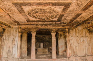 Interior view of Ravana padi rock-cut temple, Carved ceiling, carved Shiva figures and the shivalinga in the sanctum is clearly seen. Aihole, Bagalkot, Karnataka, India.