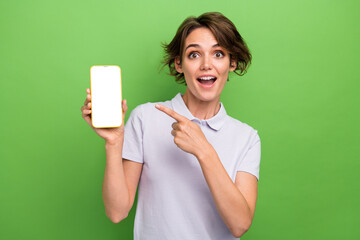 Photo of funky excited lady wear grey t-shirt showing finger apple iphone samsung gadget empty...
