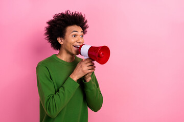 Photo of happy positive guy hold bullhorn shout spread information isolated pastel color background