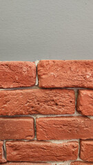 half gray painted half brick covered wall background
