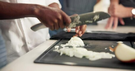 Chef, hands and onions for cutting in kitchen, teaching and learn for professional skills. Restaurant, food or vegetable chop for culinary student person, ingredient and cooking with speed for recipe