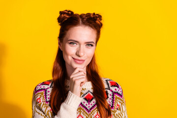 Photo portrait of attractive young woman minded empty space dressed stylish knitted warm outfit isolated on yellow color background