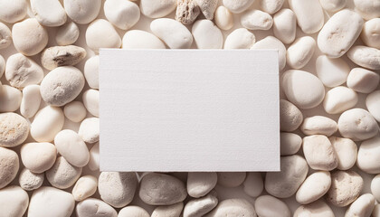 Mock-up of blank white poster on rock wall. Empty canvas for showcasing your artwork or design