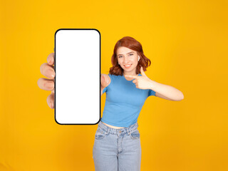 Close up phone mock up, young fun charming caucasian red bob hair woman hold use point finger on...