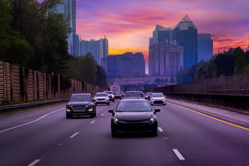 Car driving on freeway at sunset, 