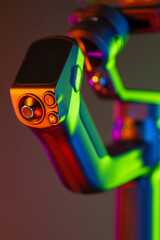 Close up on a modern gimbal for videomaking, background is black. - 802223929