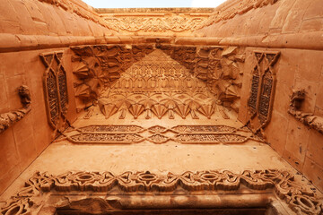 The elaborate patterns and details carved into the majestic ottoman gate, doorway seen from the...