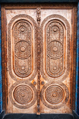 ancient Islamic pattern Uzbek traditional ornament on wooden carved door in Museum of Political Repression in Tashkent in Uzbekistan