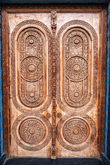 ancient Islamic pattern Uzbek traditional ornament on wooden carved door in Museum of Political...