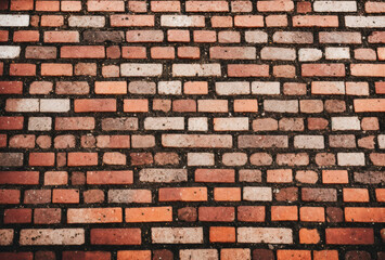 Obraz premium Modern brick pavement design on a bustling city sidewalk, featuring geometric shapes. AI generated.